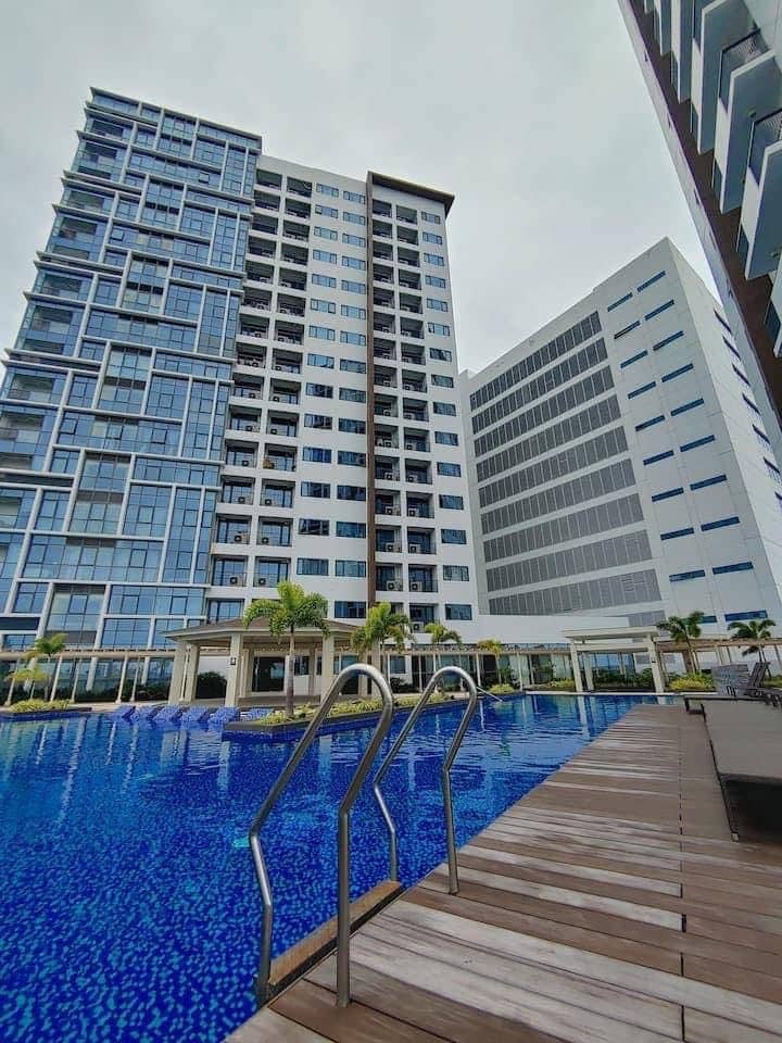 Condo with Swimming pool at Mactan Newtown